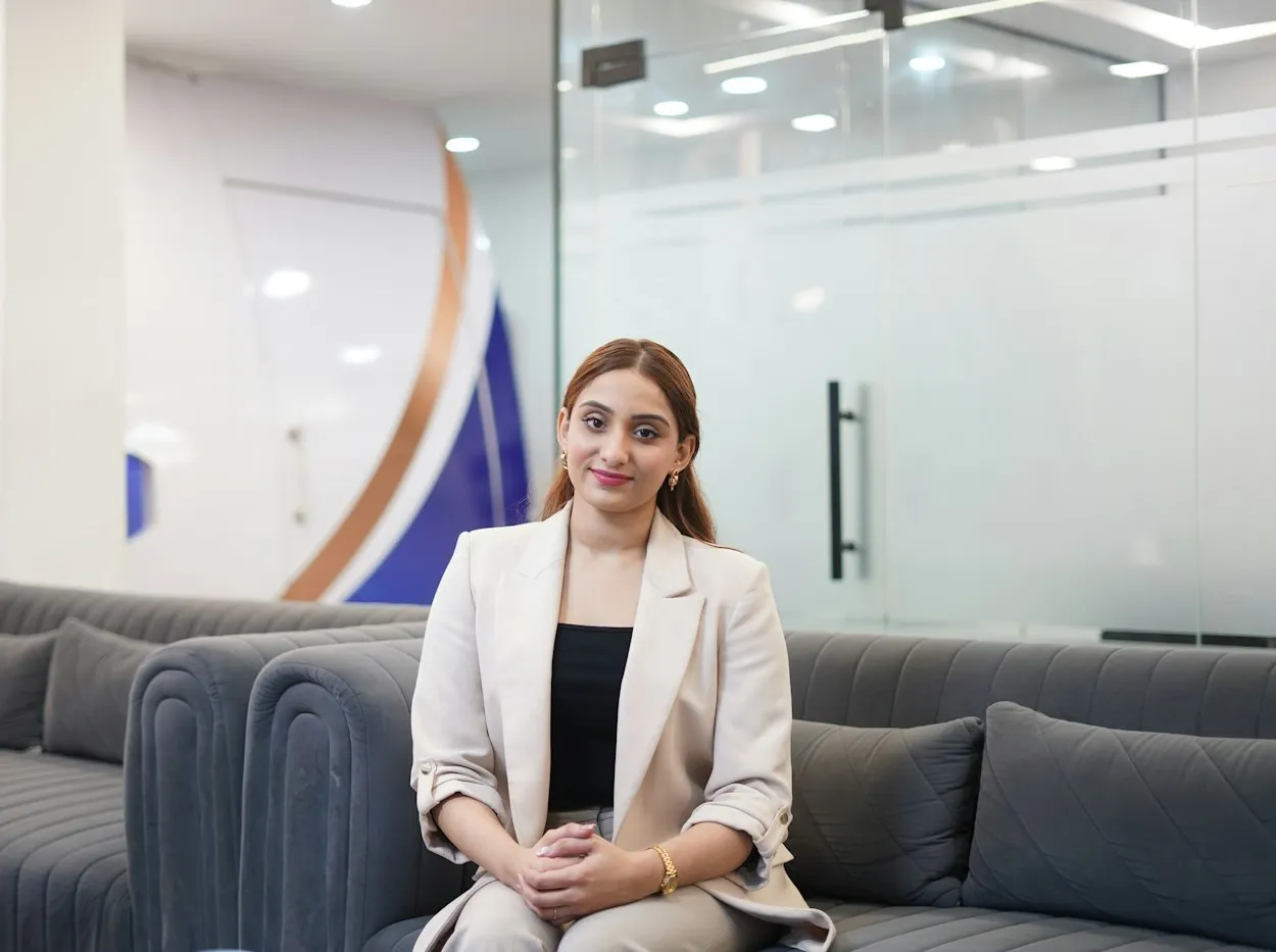 Business AI Agents - a young Indian professional in a modern office, running her business with AI on IndiaConnect AI