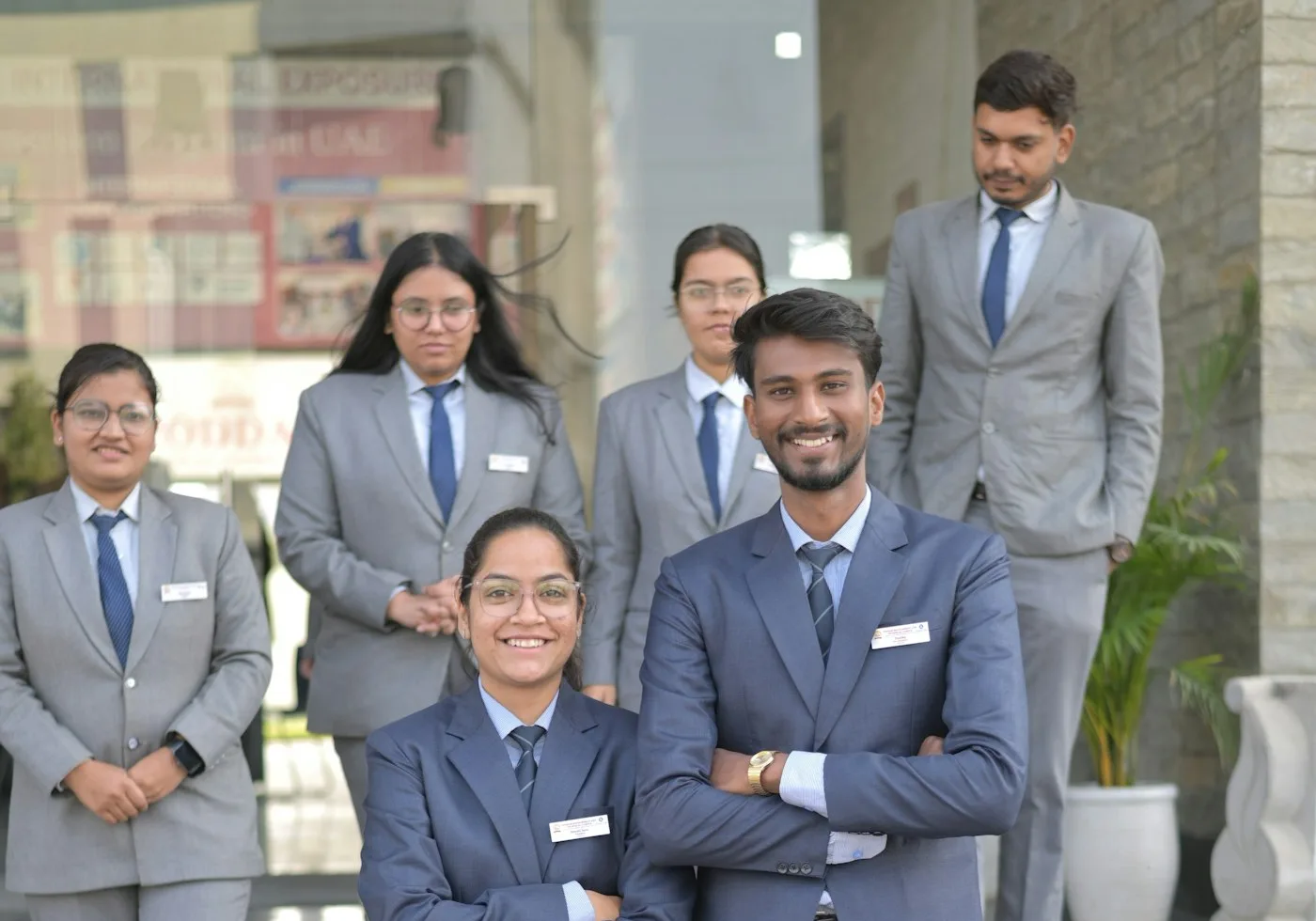 AI Native Platforms - a smiling team of young Indian professionals in business suits, connected on IndiaConnect AI